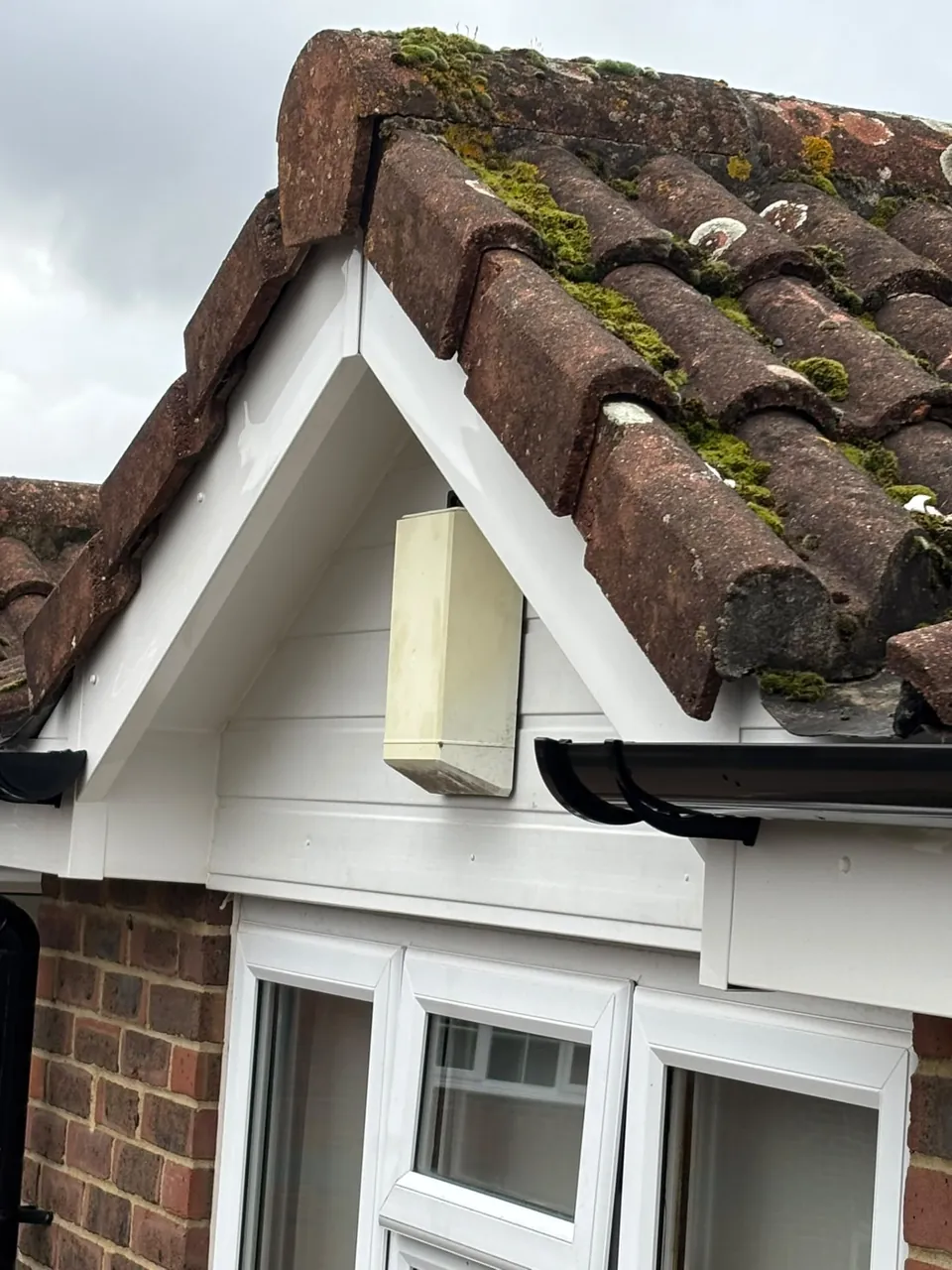 White uPVC bargeboard and soffit at a roof gable