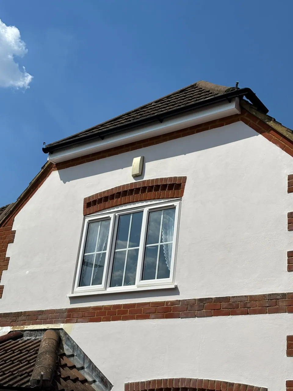 House gable with new white uPVC fascias and soffits, Aldershot