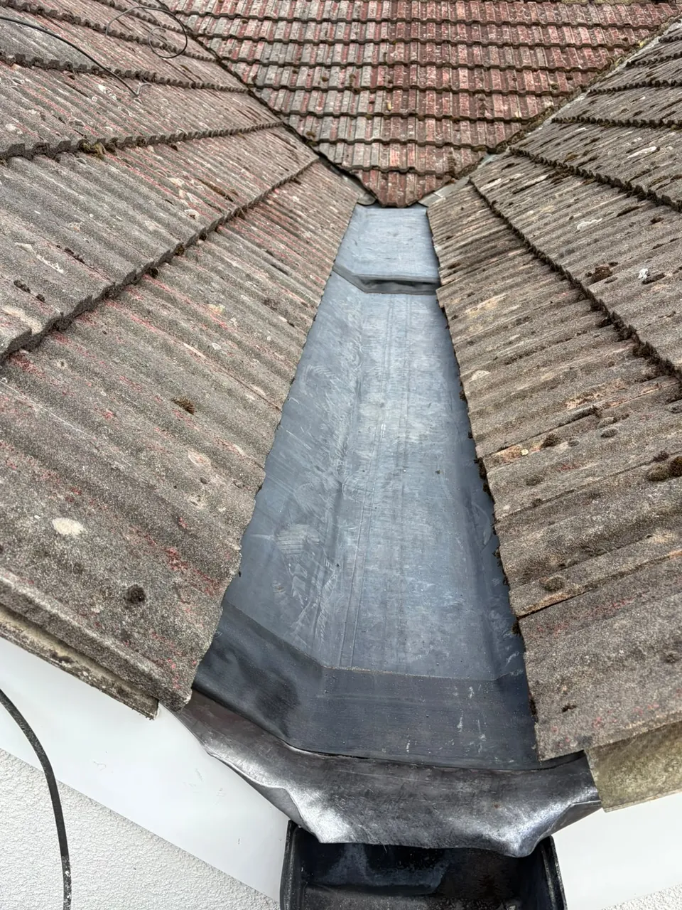 Repaired roof valley with new valley lining, Aldershot roof repair